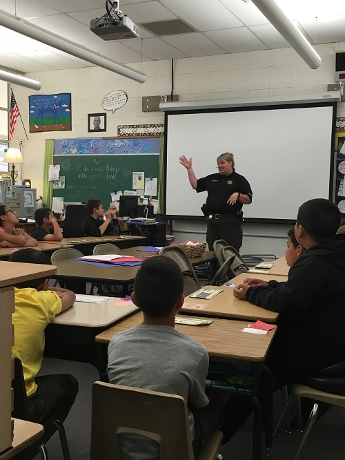 Sheriff speaking to classroom